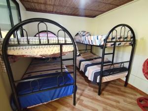 Postel nebo postele na pokoji v ubytování Irakunumi - La Posada del Puente