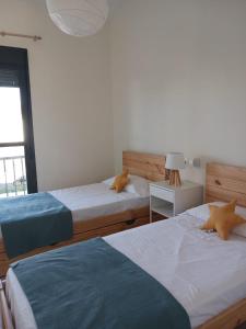 Postel nebo postele na pokoji v ubytování El Rompido - Punta Coral