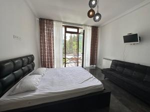 Voodi või voodid majutusasutuse Guest House Nana toas