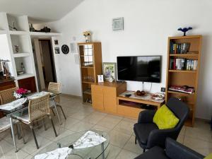 TV a/nebo společenská místnost v ubytování Casa Brigitt