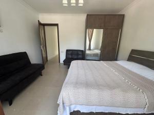 Voodi või voodid majutusasutuse Guest House Nana toas
