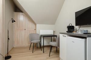 Køkken eller tekøkken på Villa 21 Boutique Rooms