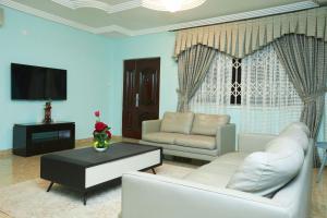 TV a/nebo společenská místnost v ubytování Paradise Castles