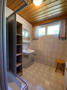 Koupelna v ubytování Obenfigerhof + 37 fotografií
