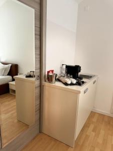 Kuchyň nebo kuchyňský kout v ubytování Hotel Locanda Castagnola