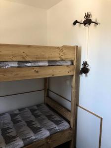 Кровать или кровати в номере Résidence L'Ours Blanc - maeva Home - Appartement vue montagne 2 pièces 4 personnes - Sélection MAE-3444