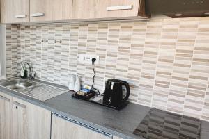 Una cocina o cocineta en Rustico da Pina con angolo cottura 6 fotos más