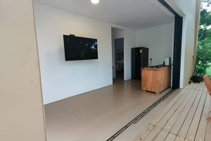 TV a/nebo společenská místnost v ubytování Alojamiento completo en el mejor clima de Colombia
