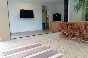 TV a/nebo společenská místnost v ubytování Alojamiento completo en el mejor clima de Colombia