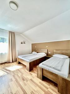 Postel nebo postele na pokoji v ubytování Casa Popa’s