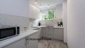 Kuchyňa alebo kuchynka v ubytovaní Twój Salon-Apartamenty Stare Miasto