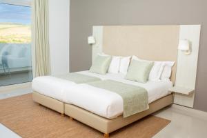 Letto o letti in una camera di Lixus Beach Resort - All In