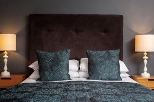 Voodi või voodid majutusasutuse George Hotel toas