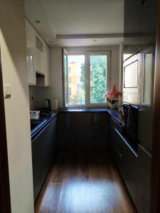 Kuchyň nebo kuchyňský kout v ubytování Apartament Sikorskiego 13 + 3 fotografie