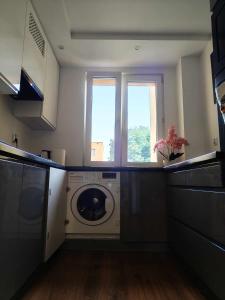Kuchyň nebo kuchyňský kout v ubytování Apartament Sikorskiego 13