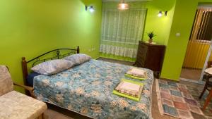 Ένα ή περισσότερα κρεβάτια σε δωμάτιο στο Gergana_apartament