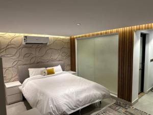 Voodi või voodid majutusasutuse كوخ ايفانا toas