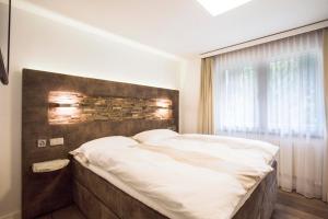 Postel nebo postele na pokoji v ubytování Haus Andorra mit Matterhornblick