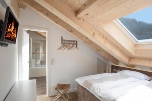 Postel nebo postele na pokoji v ubytování Haus Andorra mit Matterhornblick