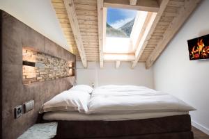 Postel nebo postele na pokoji v ubytování Haus Andorra mit Matterhornblick