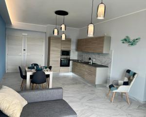 Η κουζίνα ή μικρή κουζίνα στο Milazzo blu Fronte Mare, Vista Eolie +10 φωτογραφίες