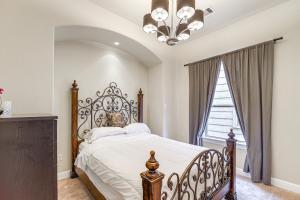 a bedroom with a large bed and a window at Dtwn Houston Home Near Stadiums WFH Friendly! in Houston