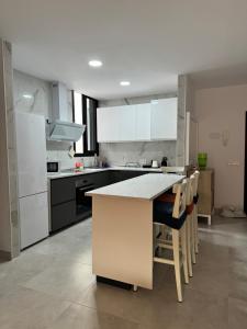 Η κουζίνα ή μικρή κουζίνα στο Apartamento Tina