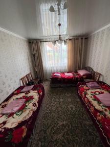 Postel nebo postele na pokoji v ubytování Guesthouse Klara