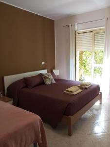 Ένα ή περισσότερα κρεβάτια σε δωμάτιο στο casa norvegese