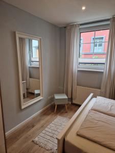 Postel nebo postele na pokoji v ubytování Haus am Markt