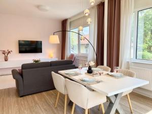 TV a/nebo společenská místnost v ubytování Zentrale Ruheoase mit Terrasse