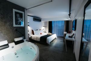Katil atau katil-katil dalam bilik di BTH Hotel – Boutique Concept