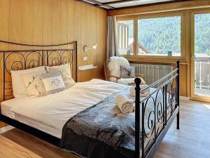 Postel nebo postele na pokoji v ubytování Appartement STERN - Confort au coeur de Saas-Fee