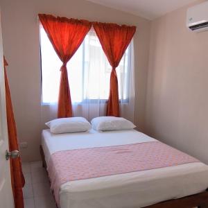 Postel nebo postele na pokoji v ubytování Villas Susurro Del Mar