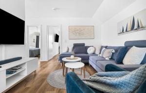 Una televisión o centro de entretenimiento en Strandzeit 31 fotos más