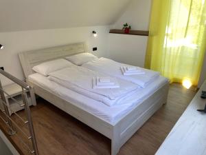 Postel nebo postele na pokoji v ubytování M3-Apartmány + 13 fotografií