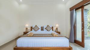 Marwati Guest House客房内的一张或多张床位