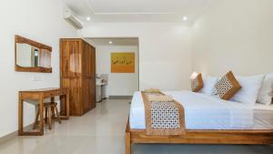 Marwati Guest House客房内的一张或多张床位