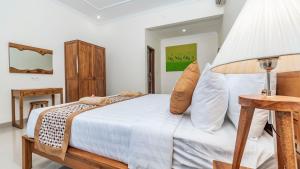 Marwati Guest House客房内的一张或多张床位