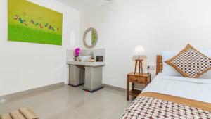 Marwati Guest House客房内的一张或多张床位