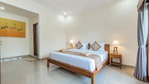 Marwati Guest House客房内的一张或多张床位
