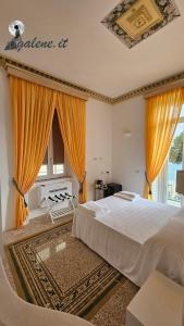 Postel nebo postele na pokoji v ubytování Galene - Beachfront in Costa d'Amalfi