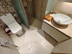 Koupelna v ubytování Hotel Nandini
