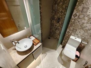 Koupelna v ubytování Hotel Nandini