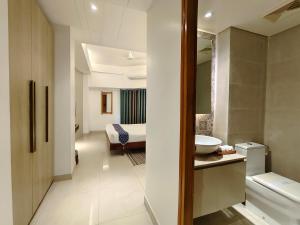 Koupelna v ubytování Hotel Nandini