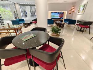 TV a/nebo společenská místnost v ubytování Hotel Nandini