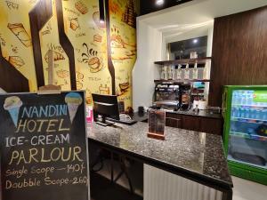 Certifikát, hodnocení, plakát nebo jiný dokument vystavený v ubytování Hotel Nandini