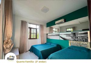 Postel nebo postele na pokoji v ubytování Rey House