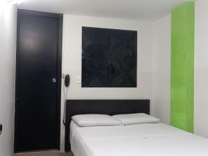 Voodi või voodid majutusasutuse Hotel Los Cristales toas