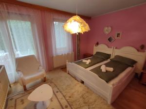 Posteľ alebo postele v izbe v ubytovaní Three Family Apartments